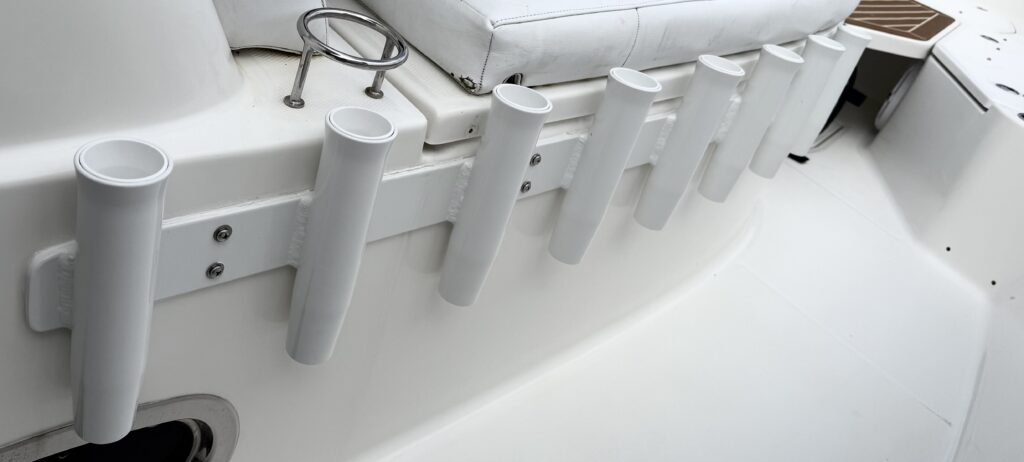 Compact coffin box rod holders